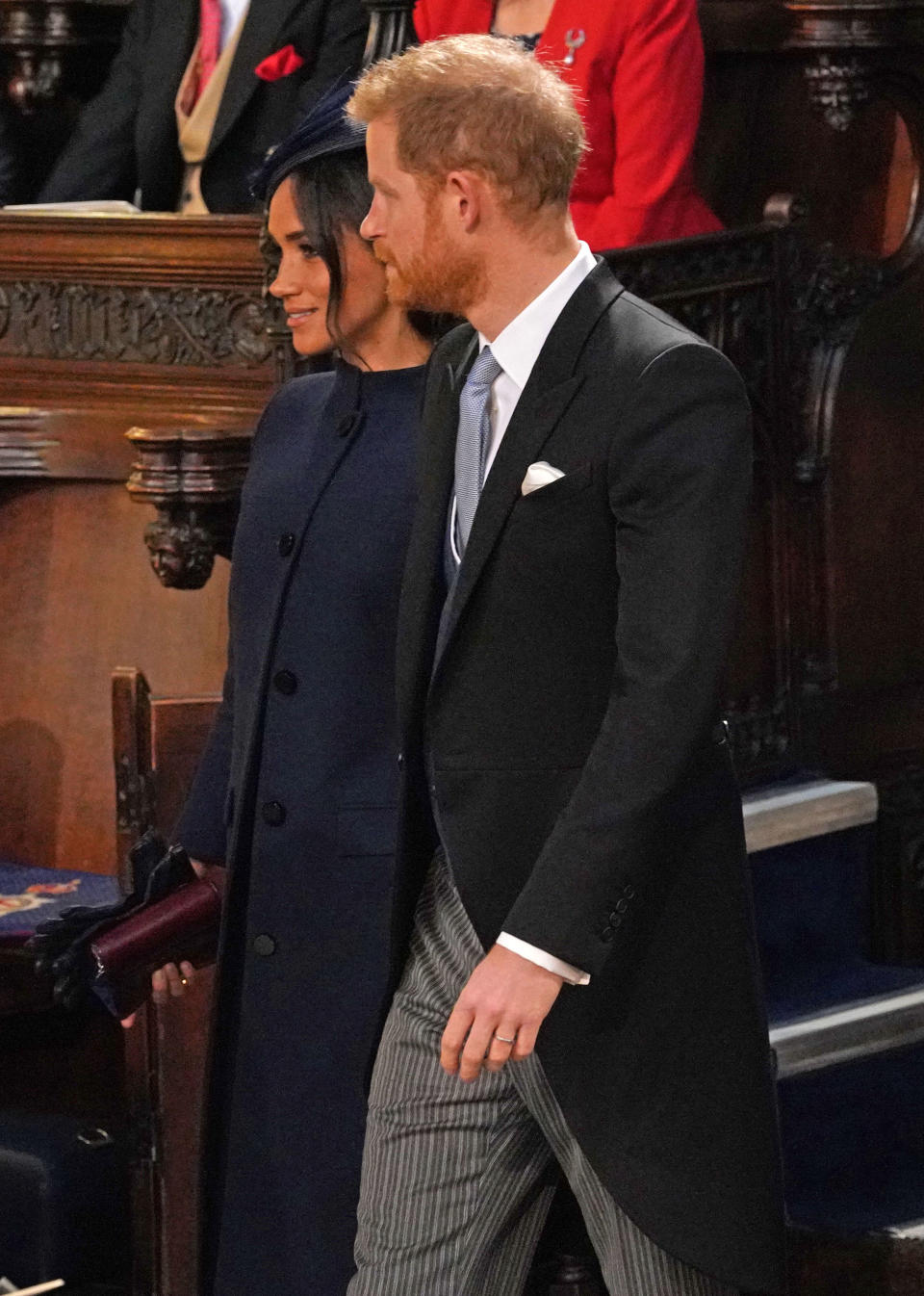 <p>Pour ce grand événement, Meghan Markle est apparue vêtue d’un manteau, seulement boutonné en haut, ne faisant alors plus vraiment de doutes sur son ventre apparent. Crédit photo : Getty Images </p>