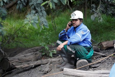 A rescue personnel takes part in a coordination effort to search for missing miners after an explosion at an underground coal mine on Friday, in Cucunuba, Colombia June 24, 2017. REUTERS/Jaime Saldarriaga