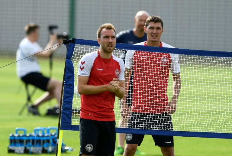 Denmark's Christian Eriksen (L) and Andreas Christensen attend a training session in Vityazevo on June 18, during the Russia 2018 World Cup football tournament