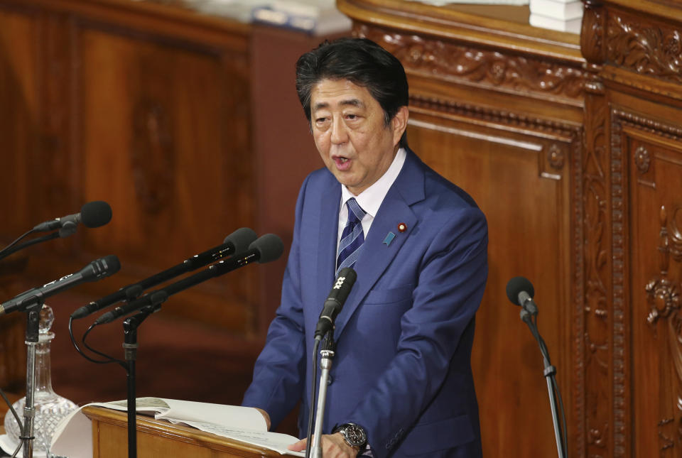 Japanese Prime Minister Shinzo Abe delivers his policy speech during a parliamentary session in Tokyo, Wednesday, Oct. 24, 2018. Abe has vowed to bolster cooperation and friendship between his country and China in a key policy speech the day before he makes the first trip to Beijing by a Japanese leader in seven years. (AP Photo/Koji Sasahara)