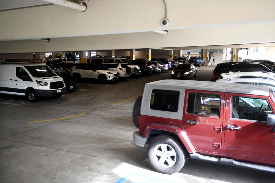 A vehicle searches for an available spot Monday in downtown Ventura, California. parking structure.