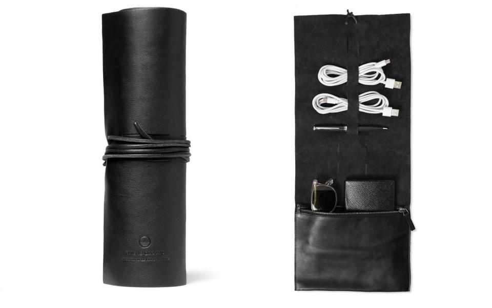 <p>Help your significant other stay tidy while traveling with this so-called Bandito lifestyle roll, by This Is Ground. With eight slots for cords, headphones, sunglasses, your passport, and more, traveling without a disorderly purse will finally be possible.</p> <p>To buy: <a rel="nofollow noopener" href="http://click.linksynergy.com/fs-bin/click?id=93xLBvPhAeE&subid=0&offerid=476536.1&type=10&tmpid=14422&RD_PARM1=https%3A%2F%2Fwww.mrporter.com%2Fen-us%2Fmens%2Fthis_is_ground%2Fbandito-leather-lifestyle-roll%2F857846&u1=TLTRVGGValentinesDayGiftsAD1Jan17" target="_blank" data-ylk="slk:mrporter.com;elm:context_link;itc:0;sec:content-canvas" class="link ">mrporter.com</a>, $85</p>