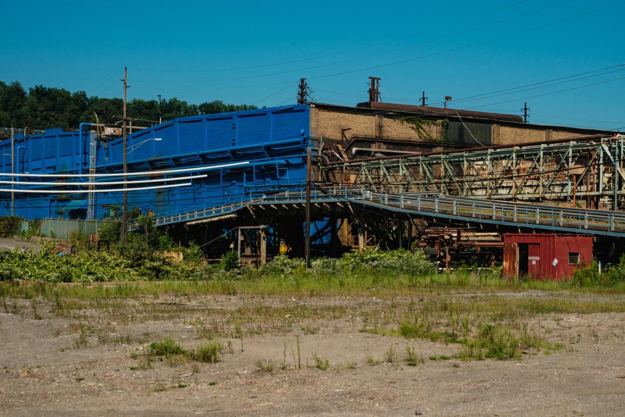 The distinctive blue paint used by Cleveland-Cliffs, Inc. – North America's largest flat-rolled steel producer and supplier of iron ore pellets serving various industries – can be seen throughout the city of Weirton, where ownership of the steel mill buildings has changed hands many times over since Weirton Steel Company was founded, Aug 28, 2023, in Weirton, WVA, United States.