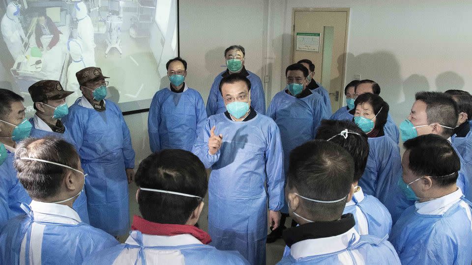 Chinese Premier Li Keqiang visits a hospital in Wuhan on January 27, 2020, days after the city was placed under a complete lockdown to curb the raging Covid-19 outbreak. - Li Tao/AP