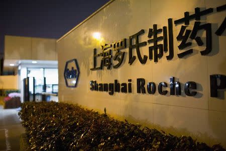 The logo of Shanghai Roche Pharmaceutical Co. Ltd. is seen outside their headquarters in Shanghai in this May 22, 2014 file photo. REUTERS/Aly Song/Files