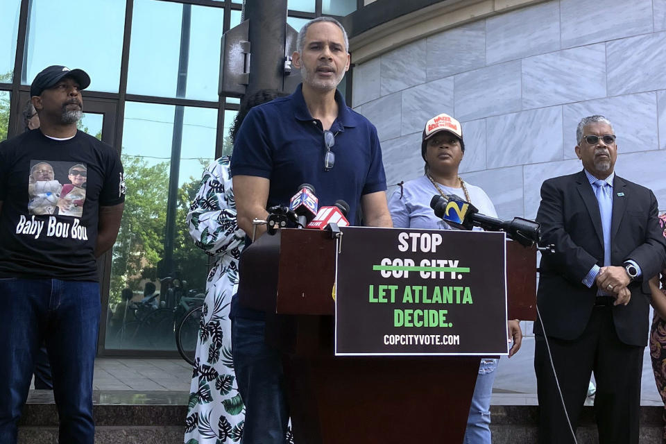 Community organizer Kamau Franklin speaks during a news conference outside Atlanta's City Hall, Wednesday, June 7, 2023, to announce an effort to force a referendum that would allow Atlanta voters to decide whether the construction of a proposed police and firefighter training center should proceed. Under the proposed referendum, voters would choose whether they want to repeal the ordinance that authorized the lease of the city-owned land upon which the project, which opponents call Cop City, is being built. (AP Photo/R.J. Rico)