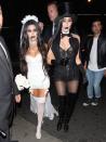 <p>Kylie’s big sister Kourtney and a gal pal dressed as a sexy zombie bride and groom for a Halloween party held at Bootsy Bellows in West Hollywood. (Photo: Bello/Splash News) </p>
