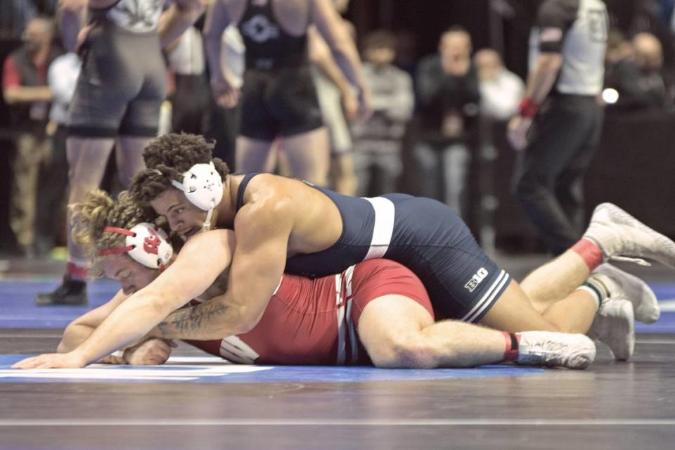 Penn State’s Greg Kerkvliet controls Wisconsin’s Trent Hillger in their 285-pound quarterfinals match of the NCAA Championships on Friday, March 17, 2023 at the BOK Center in Tulsa, Okla. Kerkvliet shut out Hillger, 4-0.