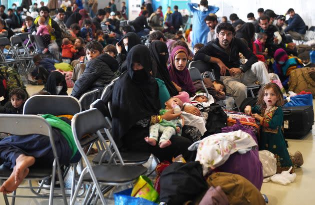 Afghan refugees are processed inside Hangar 5 at Ramstein Air Base in Germany on Sept. 8, 2021. (Photo: POOL New via Reuters)