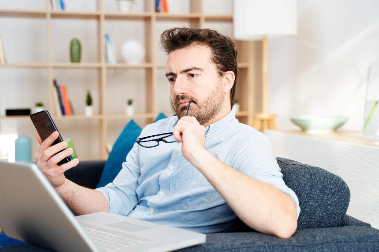 man checking his phone