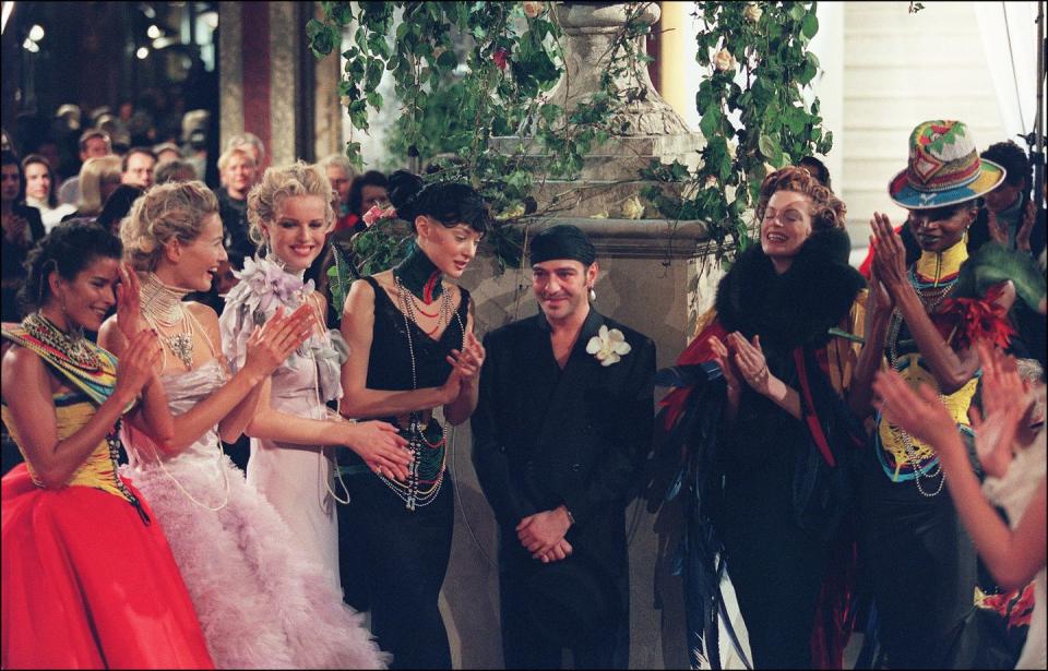 british designer john galliano is applauded by his models 20 january 1997 in paris after the presentation of christian diors springsummer haute couture collections galliano who moved across to christian dior in october 1996, presented here his first haute couture collections for the french renowned couturier afp photo pierre verdy photo credit should read pierre verdyafp via getty images