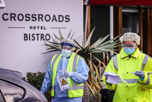 Medical staff at a pop-up COVID-19 testing clinic, perform tests on drivers in the Sydney suburb of Casula, Australia.