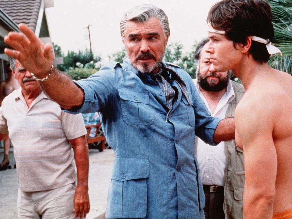 Burt Reynolds and Mark Wahlberg in ‘Boogie Nights’ (Shutterstock)