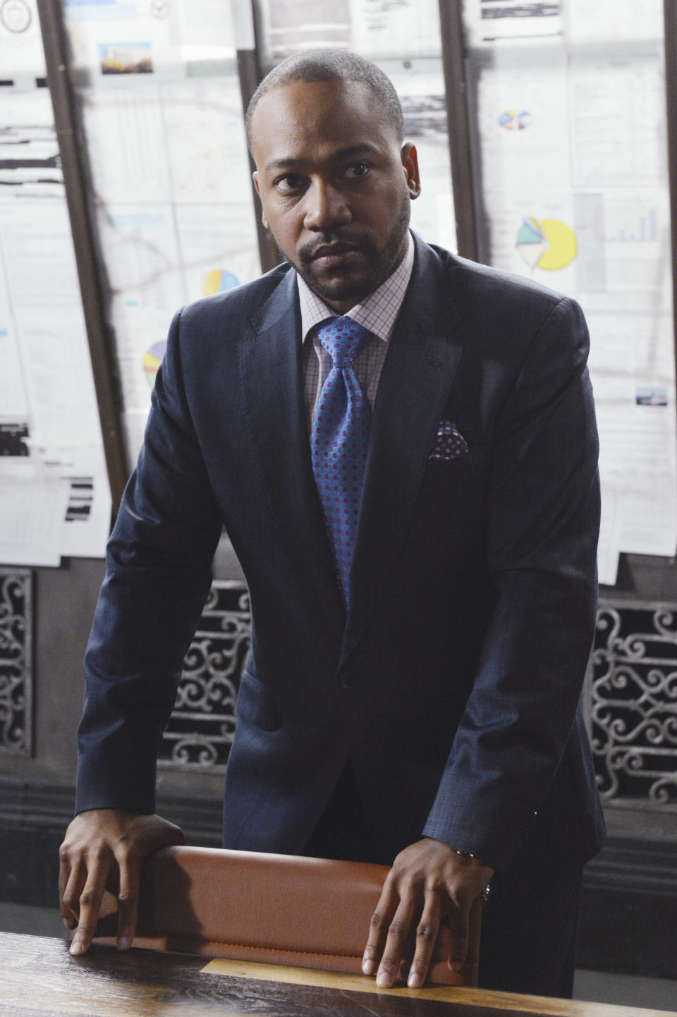 This image released by ABC shows Columbus Short portraying Harrison Wright in a scene from the TV series, "Scandal." The 31-year-old actor says in a statement on Friday, April 25, 2014, he's exiting the ABC political thriller after three seasons. (AP Photo/ABC, Eric McCandless)