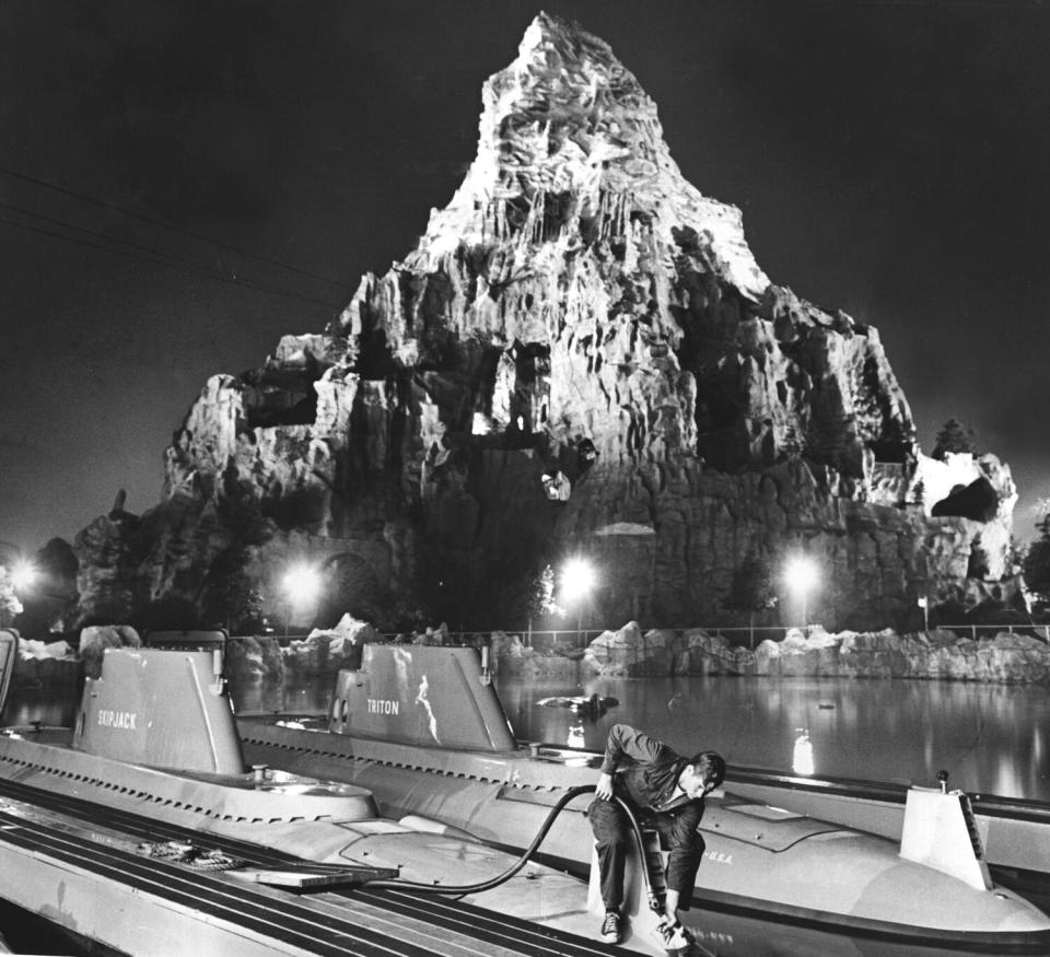 A faux snow-capped mountain with faux submarines in the foreground