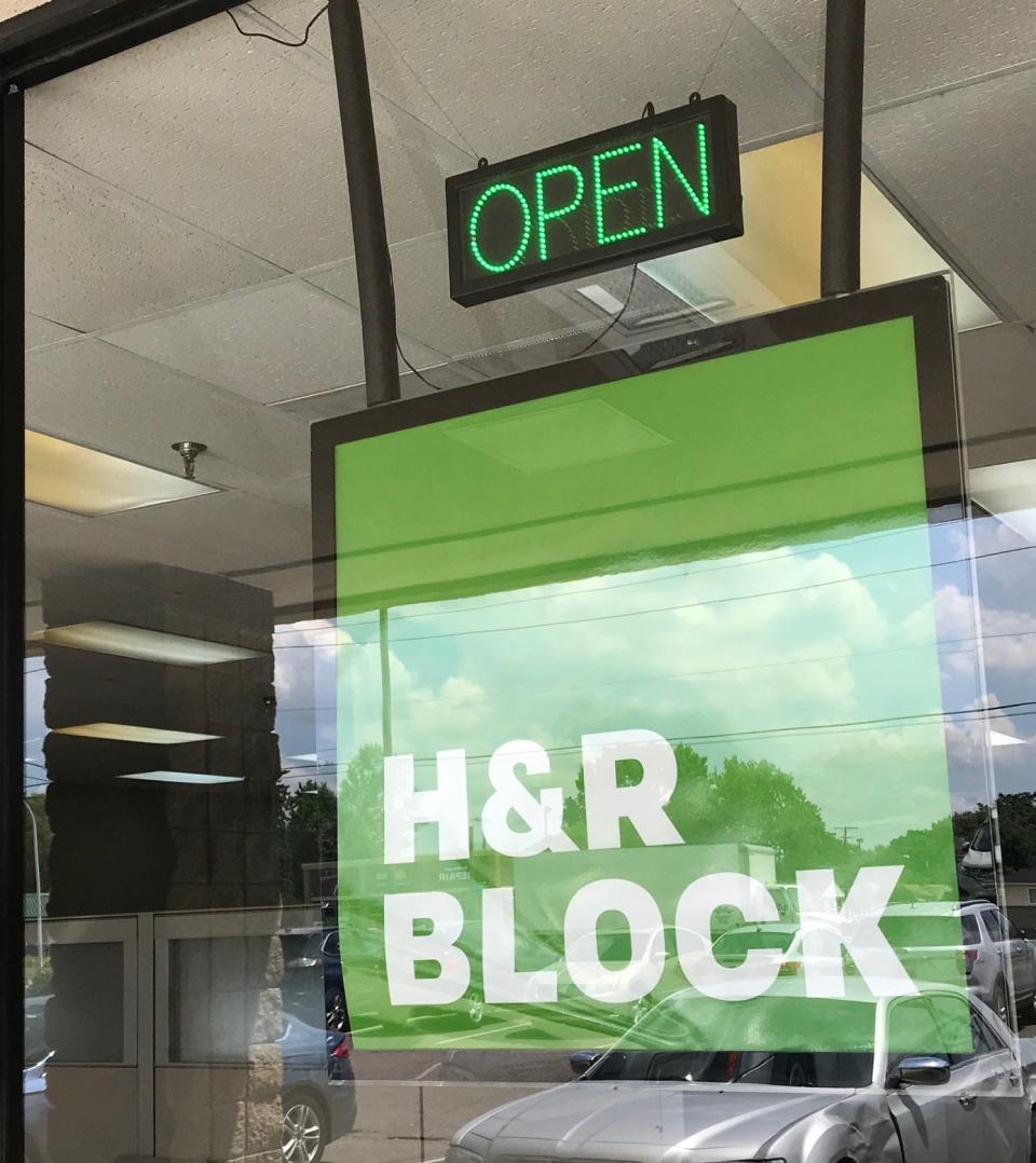 Some storefronts of national tax chains, such as H&R Block, are open for business in July as we approach a July 15 tax deadline. While most people have filed their taxes already, millions took advantage of a COVID-19 related extension. An H&R Block office window in Madison Heights, Mich., on July 1, 2020.