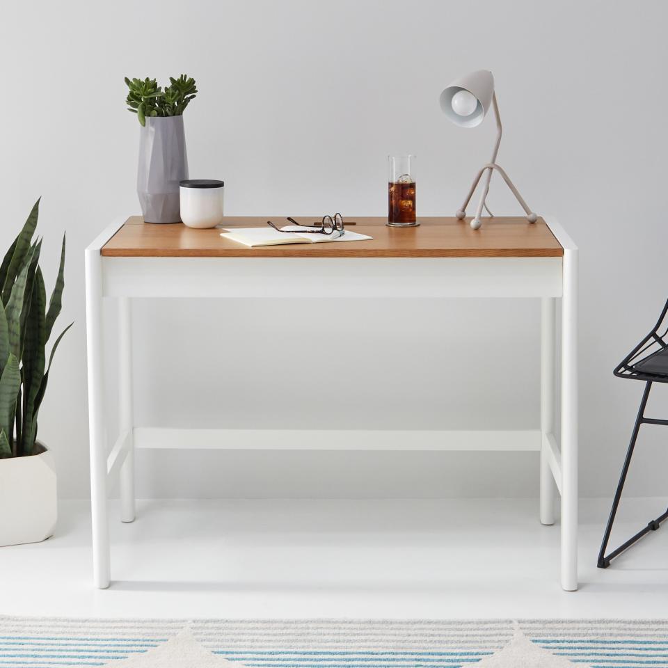 <a rel="nofollow noopener" href="https://www.walmart.com/ip/MoDRN-Scandinavian-Finna-Lift-Top-Desk/745126523" target="_blank" data-ylk="slk:SHOP NOW;elm:context_link;itc:0;sec:content-canvas" class="link ">SHOP NOW</a>: MoDRN Scandinavian Finna Lift Top Desk, $249