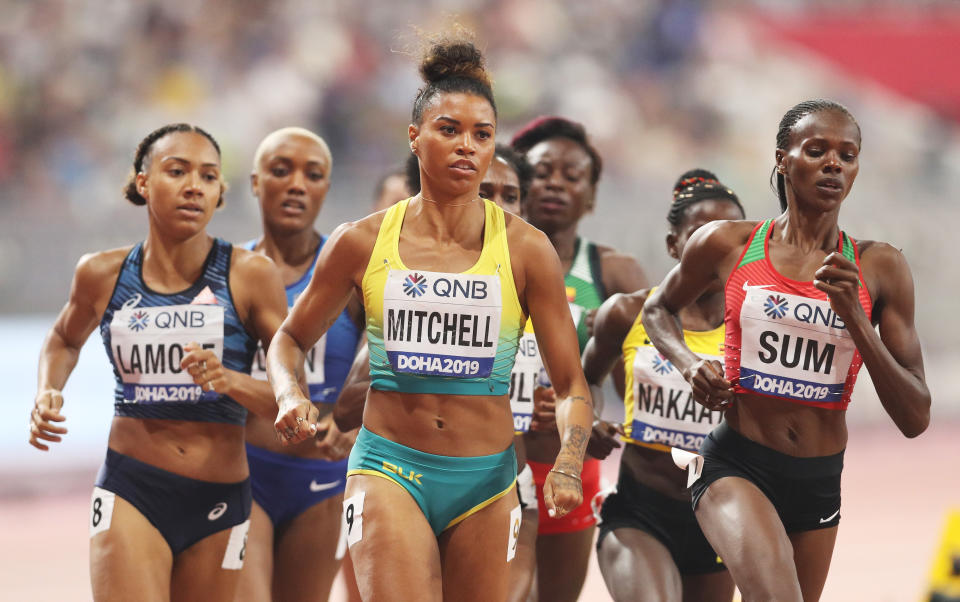 Morgan Mitchell of Australia and Eunice Jepkoech Sum of Kenya compete in the Women's 800 metres Heat 3 semi finals during day two of 17th IAAF World Athletics Championships Doha 2019