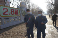 People walk on a street of Pothonggang District in Pyongyang, North Korea Wednesday, Feb. 8, 2023, on the 75th founding anniversary of the Korean People's Army. (AP Photo/Jon Chol Jin)