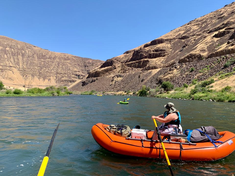 Kimberly Linkhart rows her raft down the Lower Deschutes River.