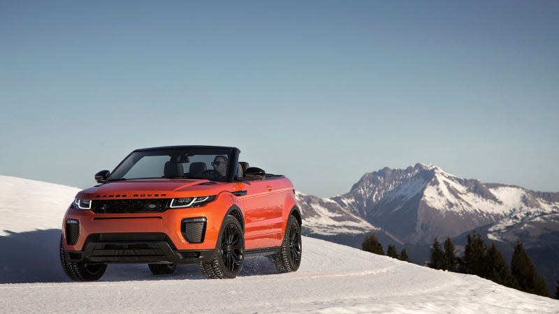 A photo of an orange Ranger Rover Convertible. 