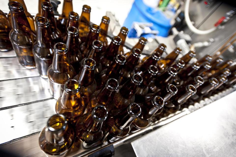 This undated photo supplied by Allagash Brewing Company shows bottles ready to be filled at the Allagash brewery in Portland, Maine. Tours of Allagash and several other local craft beer companies are among a number of free things for visitors to do in and around Maine’s biggest city. (AP Photo/Allagash Brewing, Sean Harris)