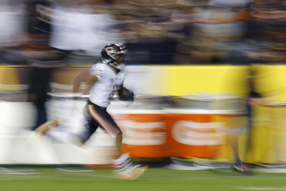 Oct 5, 2023; Landover, Maryland, USA; Chicago Bears wide receiver DJ Moore (2) runs with the ball en route to a touchdown against the <a class="link " href="https://sports.yahoo.com/nfl/teams/washington/" data-i13n="sec:content-canvas;subsec:anchor_text;elm:context_link" data-ylk="slk:Washington Commanders;sec:content-canvas;subsec:anchor_text;elm:context_link;itc:0">Washington Commanders</a> during the fourth quarter at FedExField. Mandatory Credit: Geoff Burke-USA TODAY Sports