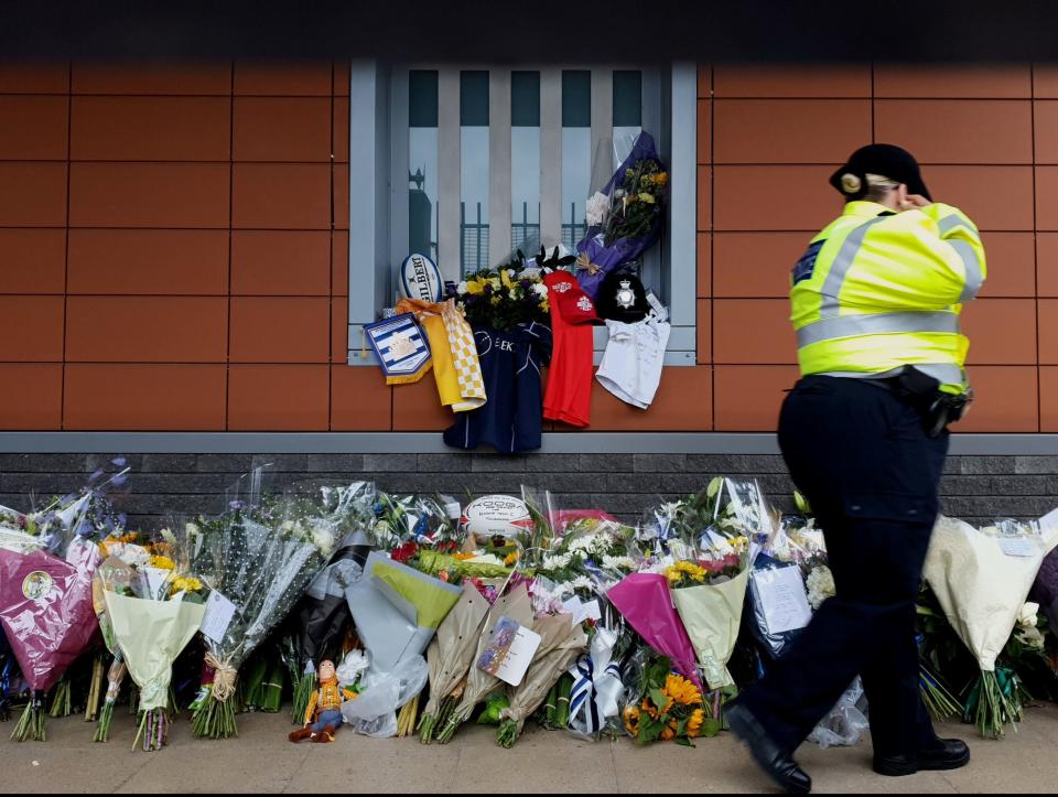 Flowers outside Croydon Custody Centre in south London  following the death of Sgt Matt Ratana (PA)