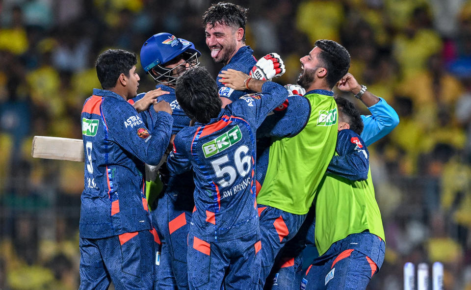 Marcus Stoinis with teammates after his century in the IPL.