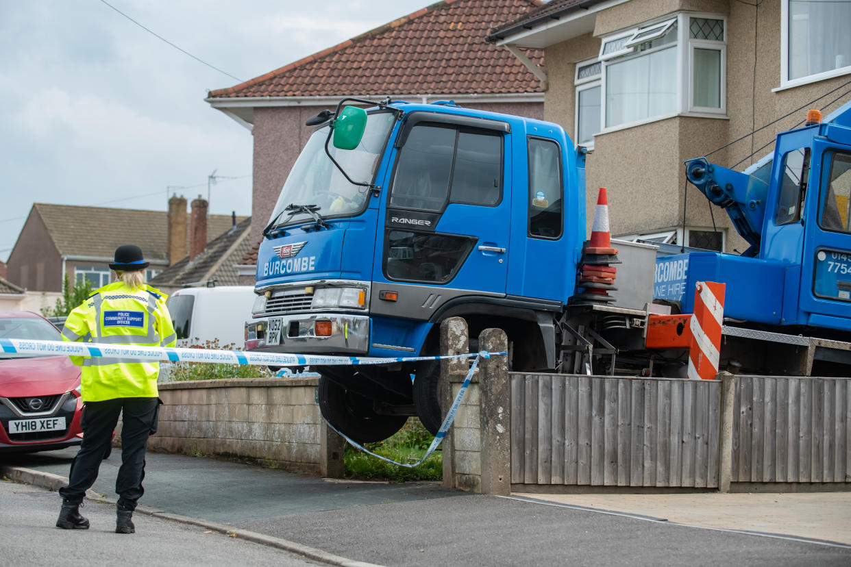 Police at the scene on Springleaze, Bristol, September 13 2021  See SWNS story SWBRcrane. Police and health and safety officials are investigating after a pensioner died when he was hit by a heavy load falling from a CRANE. Emergency services were called to the Mangotsfield area of Bristol today (Mon) after the man was struck. An Avon and Somerset police spokesman said: 