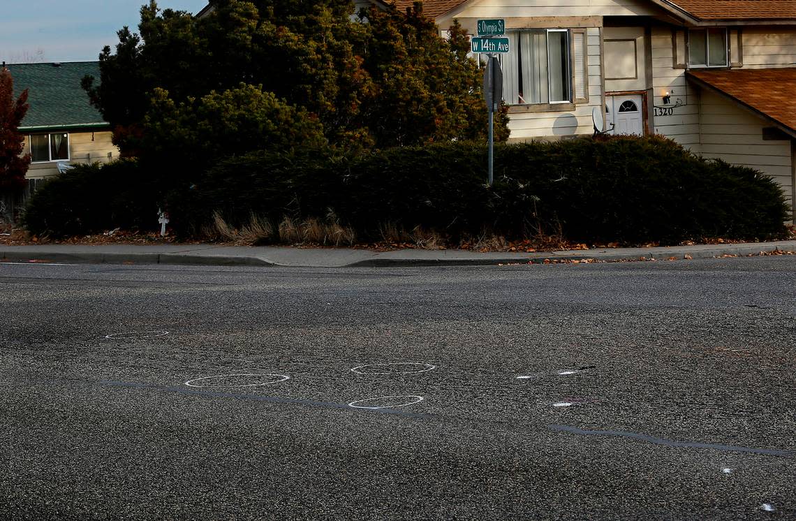 Investigative paint markings on the pavement outline the site of the early morning fatal collision involving a pedestrian on South Olympia Street at West 14th Avenue in Kennewick. Police say Ryan Shepard, 40, was fatally injured after being struck by a southbound truck when he stepped into the roadway. The driver of the truck remained at the scene and was not impaired, according to the press release.