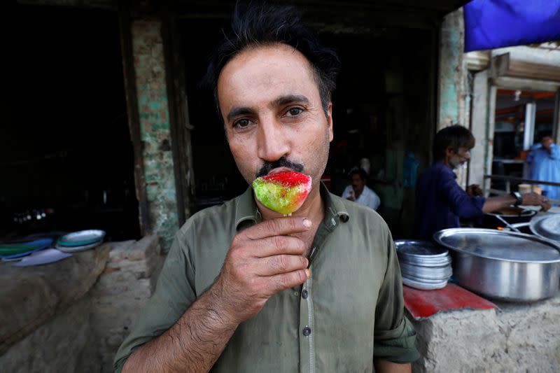 The Wider Image: In hottest city on Earth, mothers bear brunt of climate change