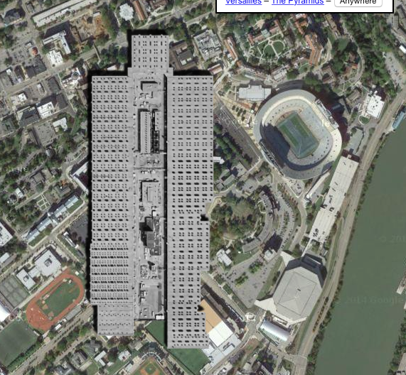 The K-25 facility is juxtaposed next to Neyland Stadium to emphasize the immensity of the building.