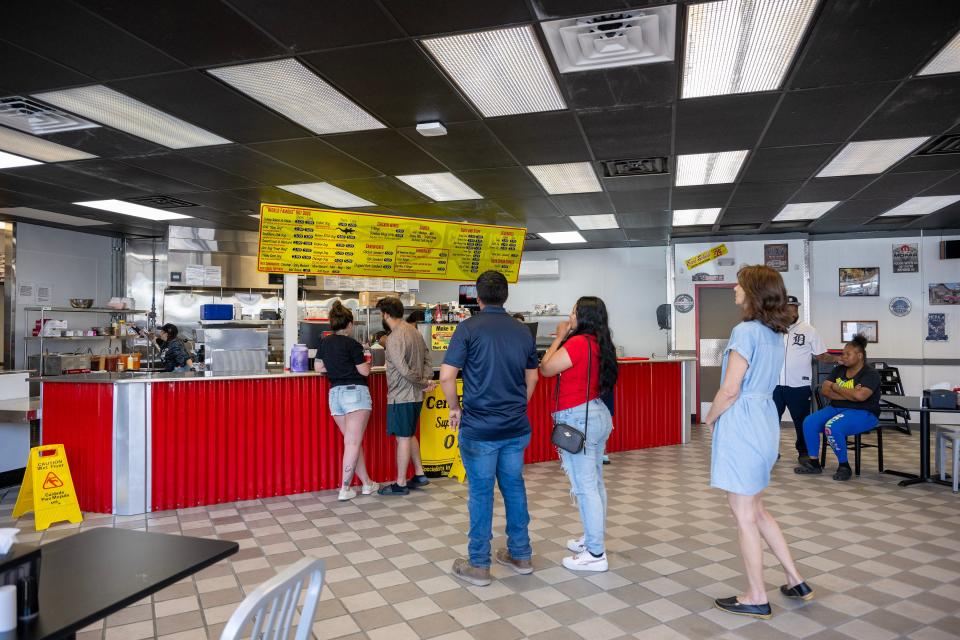 People line up to order at Coney Island Drive-Inn in Eustis.