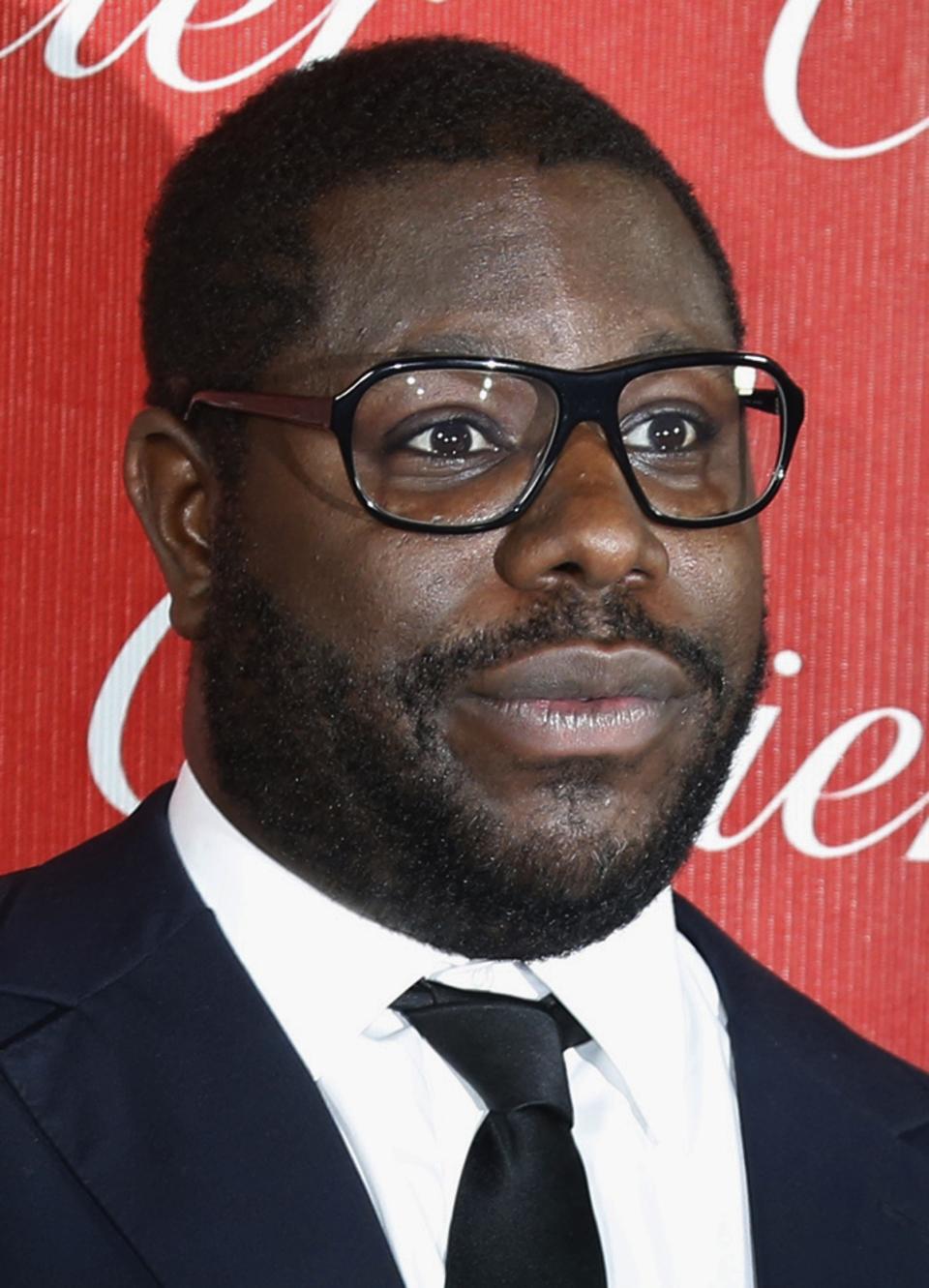 File of British film director Steve McQueen of the film "12 Years A Slave" posing after wining Director of the Year at the 2014 Palm Springs International Film Festival Awards Gala in Palm Springs