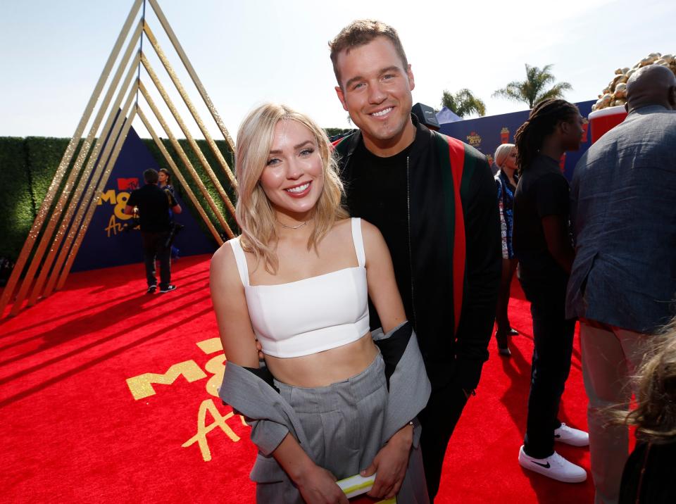 Cassie Randolph, left, and Colton Underwood arrive at the MTV Movie and TV Awards on Saturday, June 15, 2019, at the Barker Hangar in Santa Monica, Calif. (Photo by Danny Moloshok/Invision/AP)