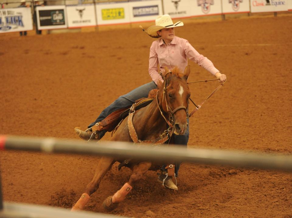 Uvalde's McKenzie Speer competes in barrel racing at the Texas High School Finals Rodeo.