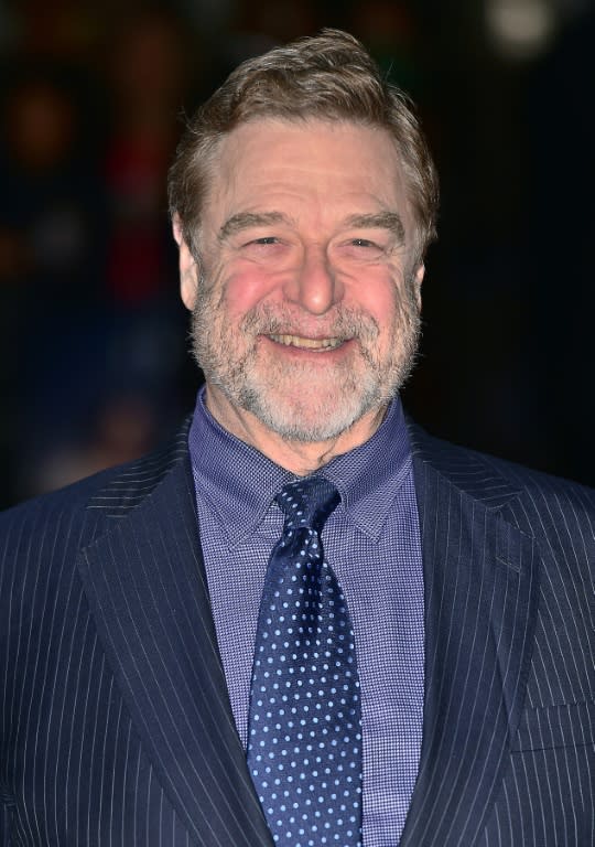 US actor John Goodman smiles as he arrives for the European premiere of the film "Trumbo" during the BFI London Film Festival in Leicester Square in central London on October 8, 2015