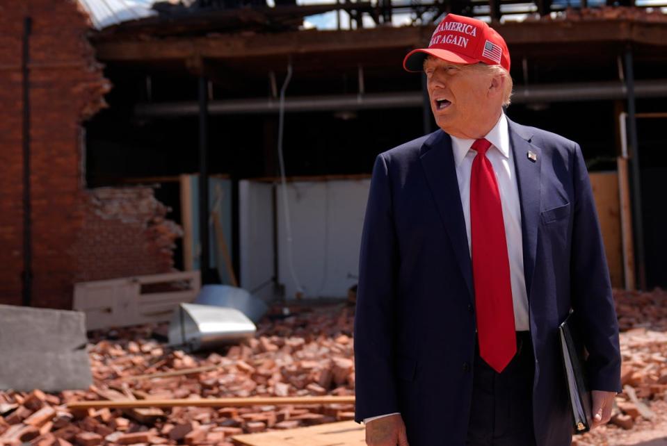 Donald Trump tours downtown Valdosta, Georgia, a town that was impacted by Hurricane Helene, on September 30. The former president and his allies have been spreading false claims about the federal government’s response to the disaster. (AP)