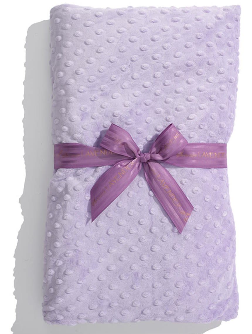 <p><strong>This lavender-scented blankie from the gods. <a rel="nofollow noopener" href="http://shop.nordstrom.com/s/sonoma-lavender-dot-spa-blankie/3167962?mbid=synd_yahoolife" target="_blank" data-ylk="slk:$70;elm:context_link;itc:0;sec:content-canvas" class="link ">$70</a></strong></p> <p>You can heat it up in the microwave or cool it down in the fridge for ultimate relaxation.</p>