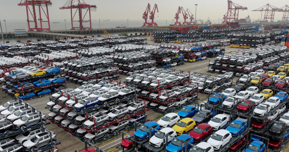 This aerial photograph taken on April 16, 2024 shows electric cars for export stacked at the international container terminal of Taicang Port in Suzhou, in China's eastern Jiangsu Province. (Photo by AFP) / China OUT (Photo by STR/AFP via Getty Images)