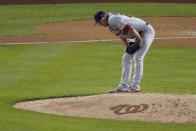 St. Louis Cardinals starting pitcher Jack Flaherty reacts after giving up a two-run scoring double to Washington Nationals' Howie Kendrick during the third inning of Game 3 of the baseball National League Championship Series Monday, Oct. 14, 2019, in Washington. (AP Photo/Alex Brandon)