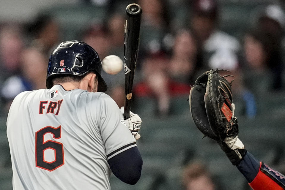 Cleveland Guardians first base David Fry (6) ducks a ball against the Atlanta Braves during the fourth inning of a baseball game, Friday, April 26, 2024, in Atlanta. (AP Photo/Mike Stewart)