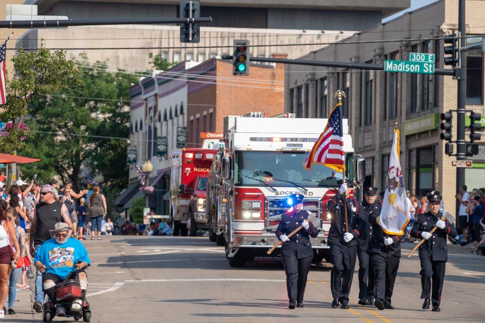 The Rockford Fire Department marches down East State Street during the city's annual Fourth of July parade on Sunday, July 4, 2021, in Rockford.