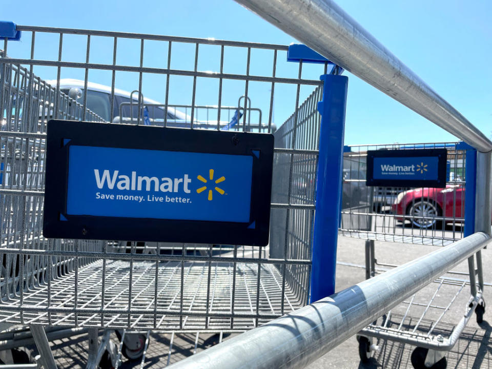 ROHNERT PARK, CALIFORNIA - AUGUST 04: Shopping carts sit in the parking lot of a Walmart store on August 04, 2022 in Rohnert Park, California. Walmart plans to lay off hundreds of corporate employees in a restructuring effort after the retailer cut its profit outlook for the second quarter and the remainder of the year. (Photo by Justin Sullivan/Getty Images)