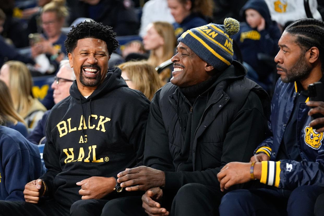 Former Fab Five Michigan basketball players from left: Jalen Rose, Chris Webber and Jimmy King watch the first half against Ohio State in Ann Arbor, Monday, Jan. 15, 2024.