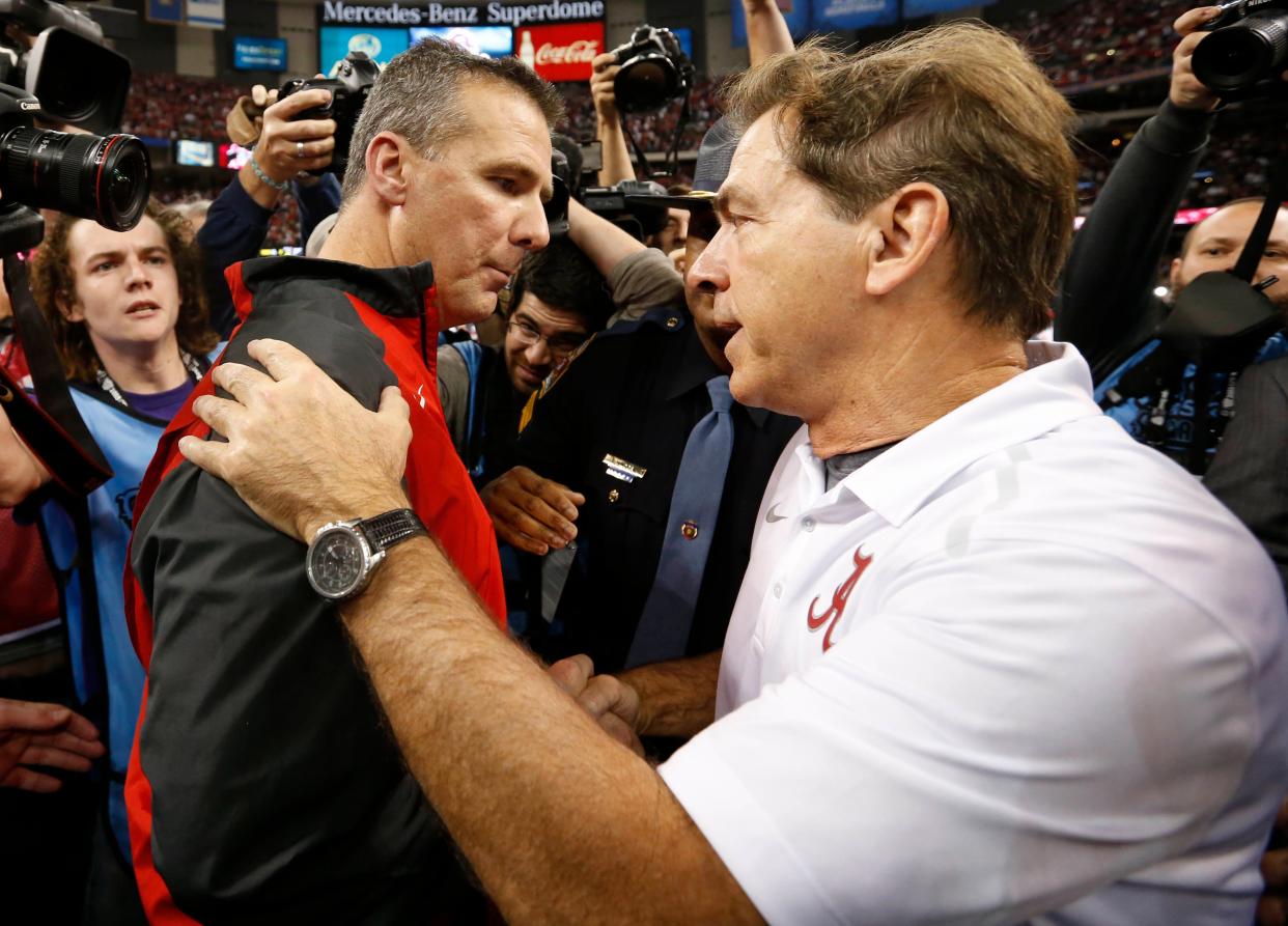 Urban Meyer shakes hands with Nick Saban after Ohio State beat Alabama in the 2015 Sugar Bowl.