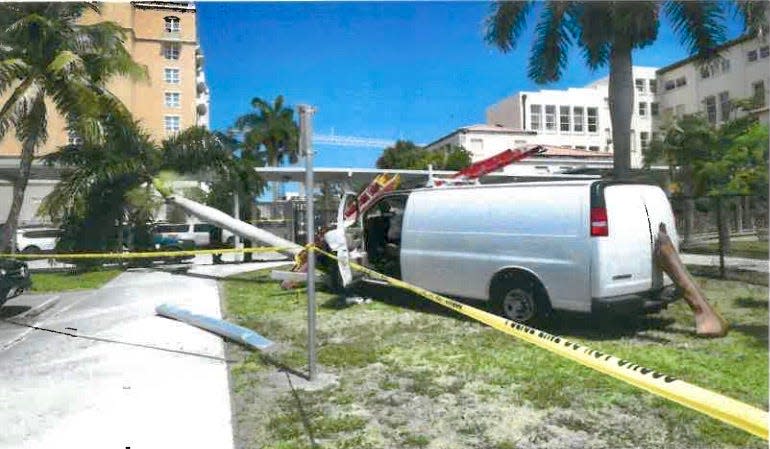 Romen Phelps' van as it came to rest on May 13, 2022, on the Dreyfoos School of the Arts campus. It was going 70 mph, investigators determined, before it hit a palm tree. Phelps was shot to death by West Palm Beach police Sgt. Christopher Nagel not long after the crash at the theatre in Meyer Hall.