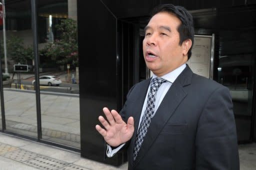 File photo of Hong Kong tycoon and Birmingham City owner Carson Yeung outside the Wan Chai Law Courts in Hong Kong. He was arrested and charged in June 2011 with five counts of "dealing with property known or believed to represent proceeds of an indictable offence"