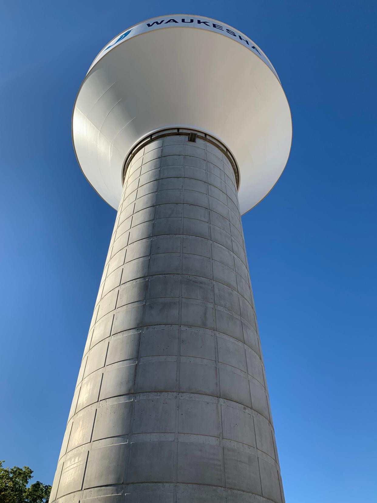 The water tower at the Waukesha Booster Pumping Station stands tall against a blue sky just days before the transition from groundwater to Lake Michigan water began Oct. 9. The city's water service area reached its 90% transition benchmark in less than five days. The rest of the transition will follow within several weeks.